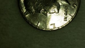 1971-Kennedy-Half-With-Reminents-Of-Another-Coin-On-The-Rim.